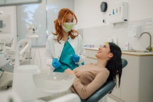 Patient and dentist having a friendly conversation